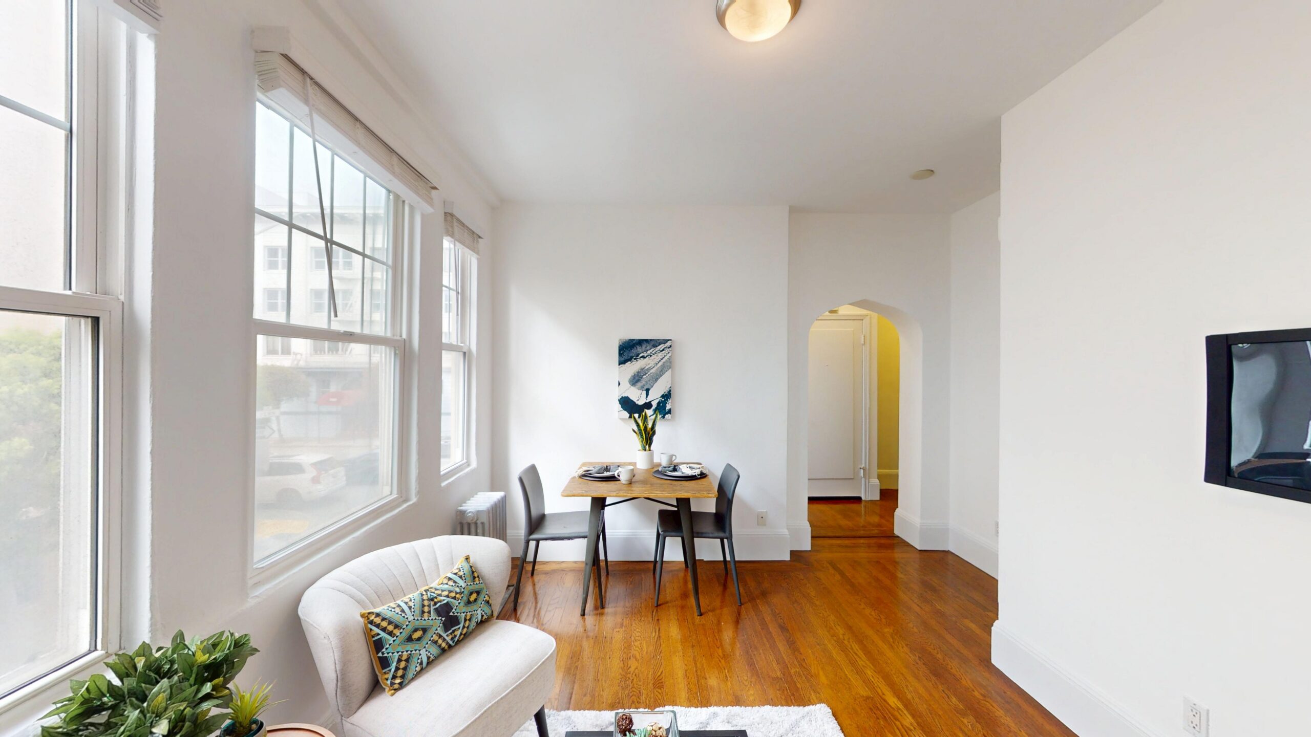 Living room of a staged apartment at 1520 Gough Street, Unit 206, San Francisco