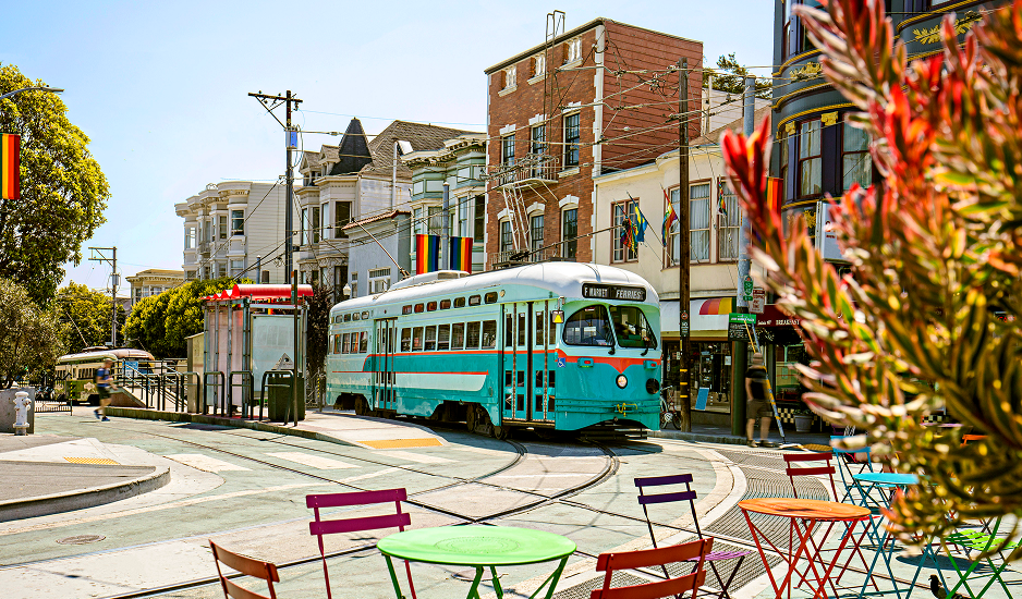 A blue Muni bus on a San Francisco street